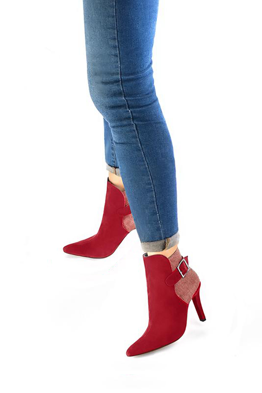 Cardinal red women's ankle boots with buckles at the back. Tapered toe. Very high slim heel. Worn view - Florence KOOIJMAN